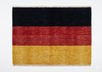 Hand-knotted wool Germany flag rug in black, red and gold