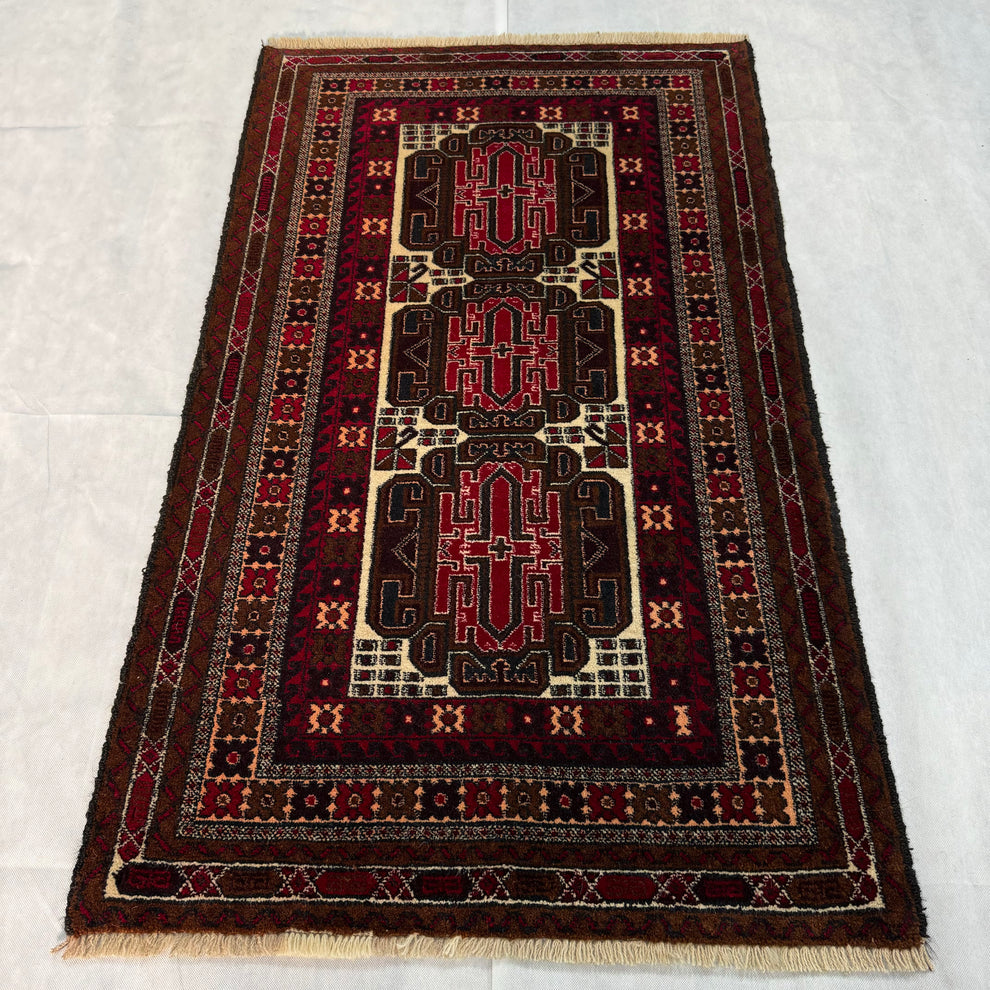 Baluchi Three-Medallion Geometric Bordered Mat