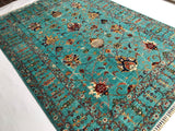 Teal Oasis Area Rug