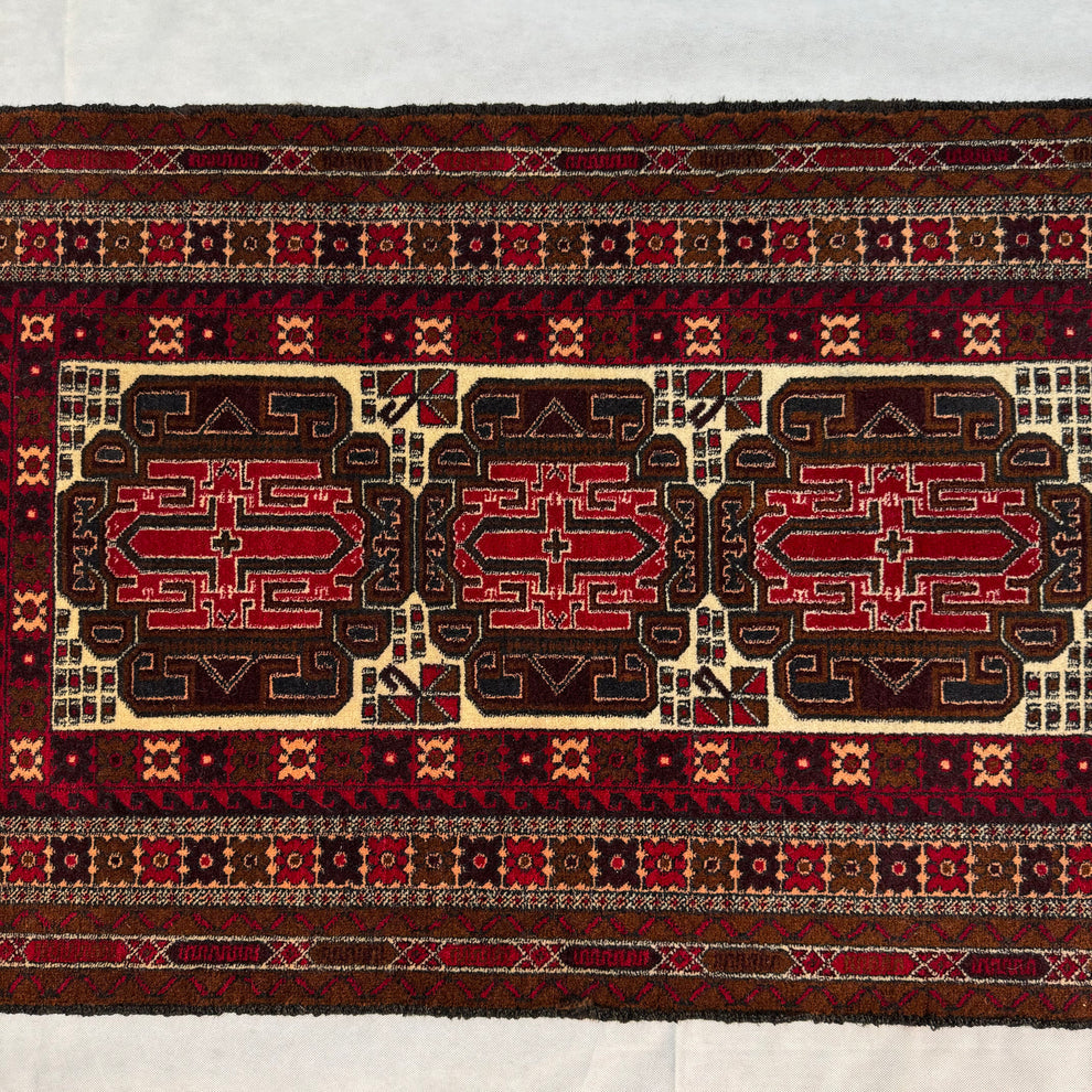Baluchi Three-Medallion Geometric Bordered Mat